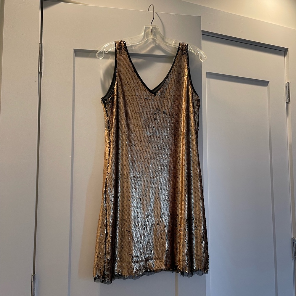 Gold/black sequin dress with distressed hem